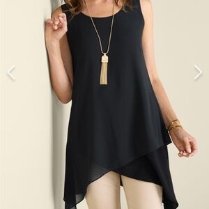 Sleeveless Celine Top. Sleeveless asymmetrical criss-cross. Scoop neck.